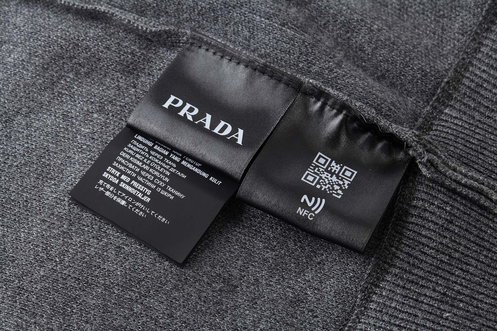 PRADA CASHMERE CREWNECK SWEATER WITH GRAPHIC PRINT