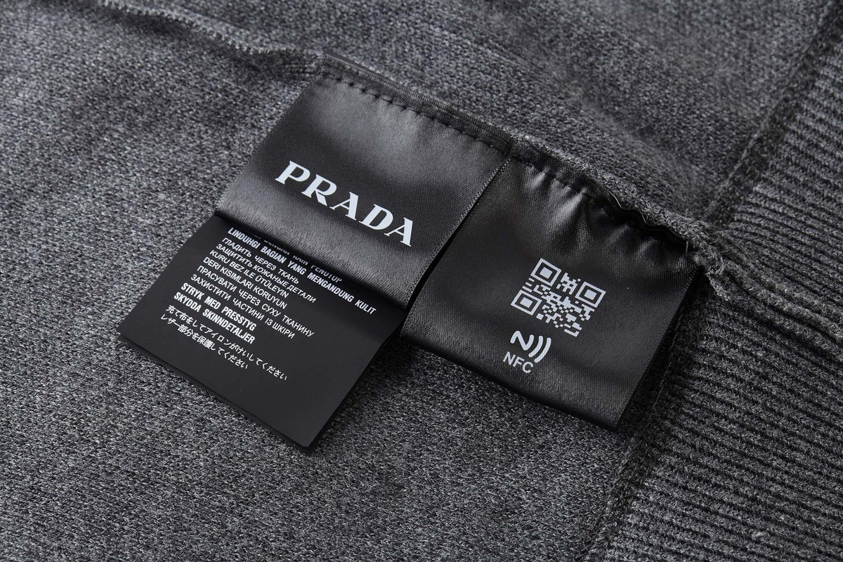 PRADA CASHMERE CREWNECK SWEATER WITH GRAPHIC PRINT
