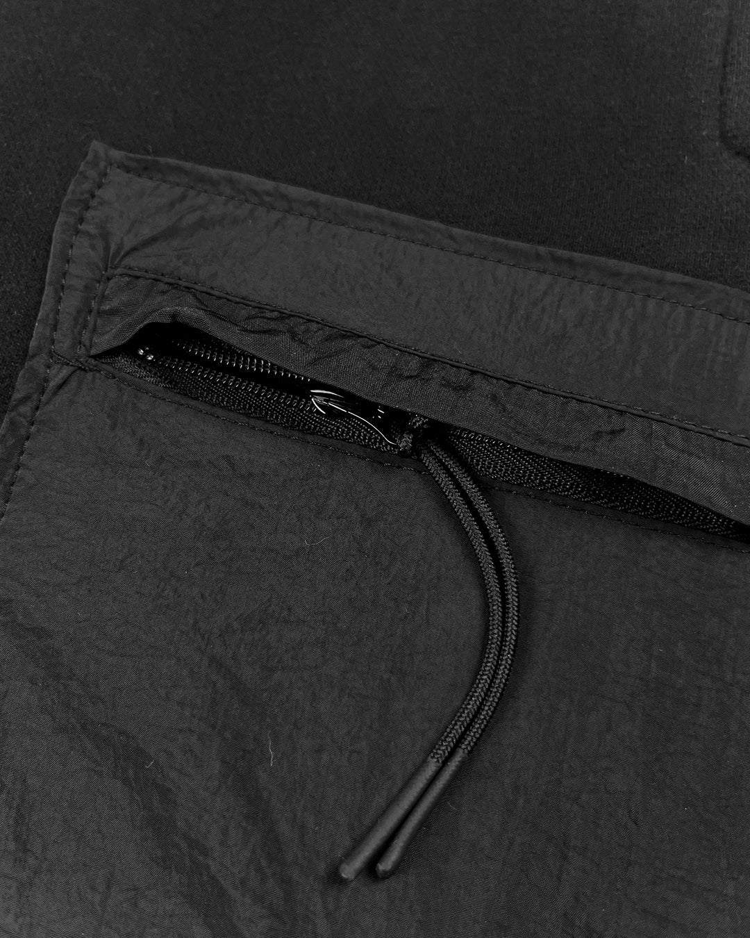 C.P. COMPANY DIAGONAL FLEECE MIXED UTILITY PANTS BLACK