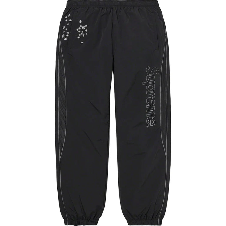 SUPREME AOI GLOW-IN-THE-DARK TRACK PANT IN BLACK