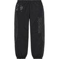 SUPREME AOI GLOW-IN-THE-DARK TRACK PANT IN BLACK