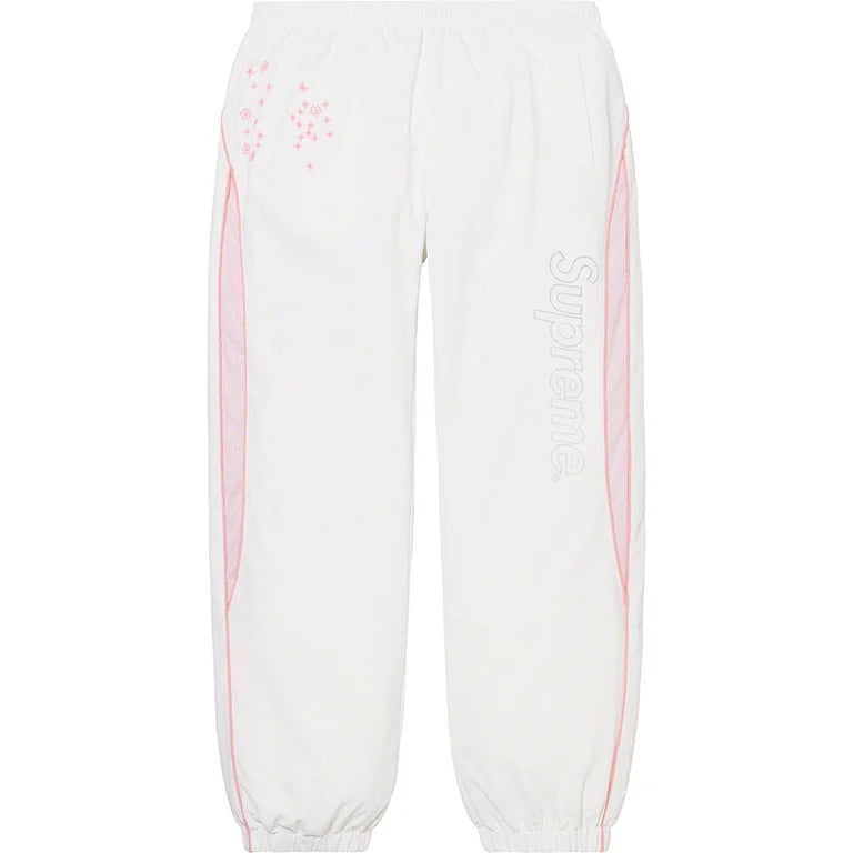 SUPREME AOI GLOW-IN-THE-DARK TRACK PANT IN WHITE