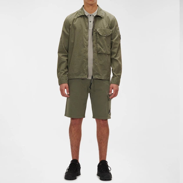 C.P. COMPANY LIGHT FLEECE LENSE BERMUDA SHORTS IN KHAKI