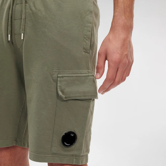 C.P. COMPANY LIGHT FLEECE LENSE BERMUDA SHORTS IN KHAKI
