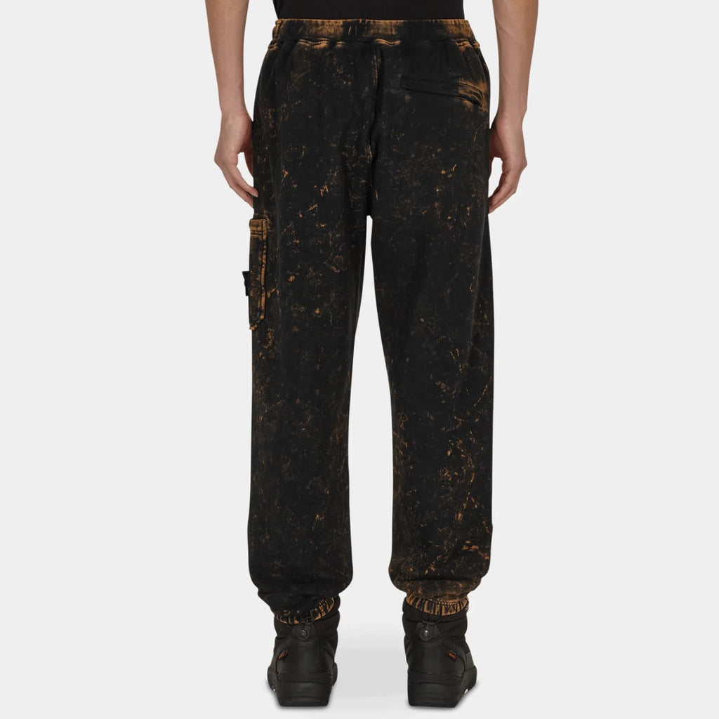 STONE ISLAND OFF-DYE OVD SWEATPANTS IN BLACK