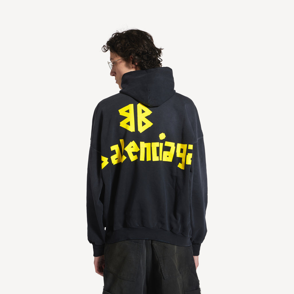 BALENCIAGA TAPE TYPE RIPPED POCKET HOODIE OVERSIZED IN BLACK FADED