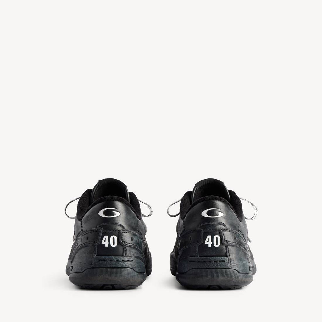 BALENCIAGA HAMPTONS WORN-OUT SNEAKER IN BLACK