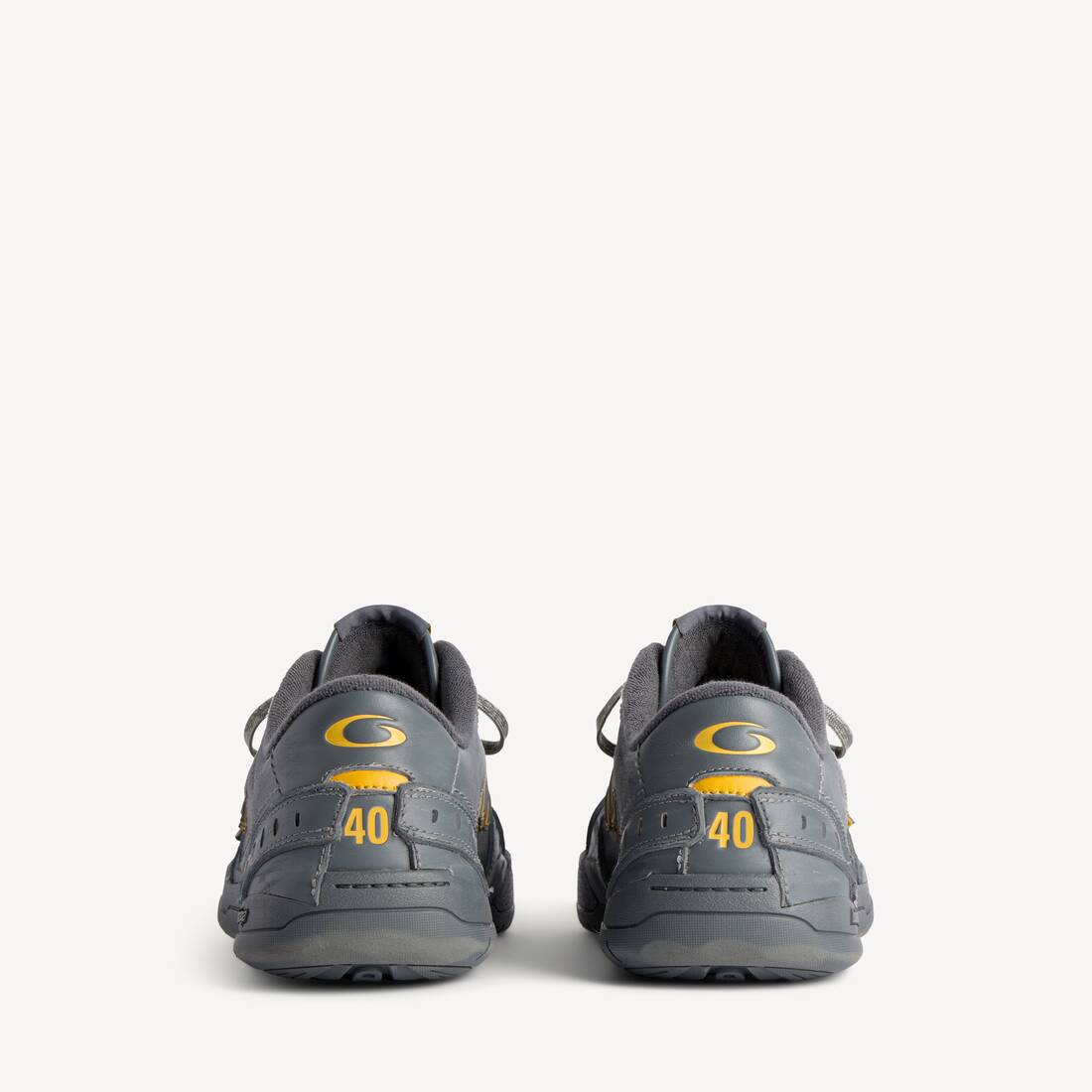 BALENCIAGA HAMPTONS WORN-OUT SNEAKER IN GREY/YELLOW