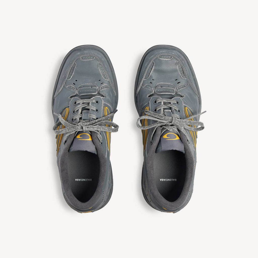 BALENCIAGA HAMPTONS WORN-OUT SNEAKER IN GREY/YELLOW