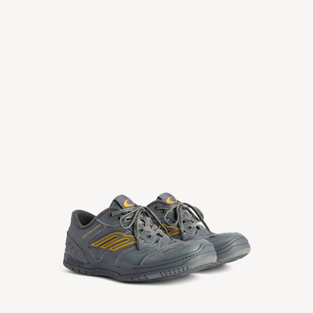 BALENCIAGA HAMPTONS WORN-OUT SNEAKER IN GREY/YELLOW