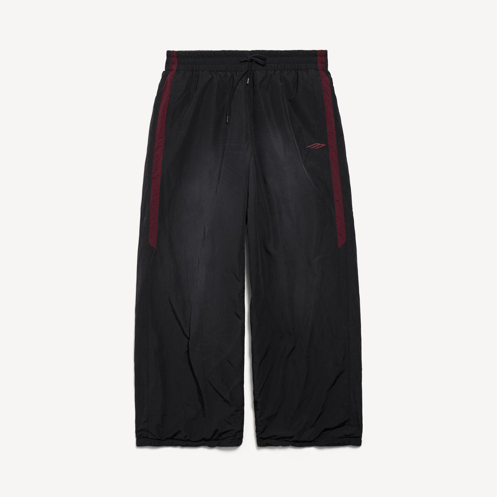 BALENCIAGA REVERSIBLE TRACKSUIT PANTS IN BLACK