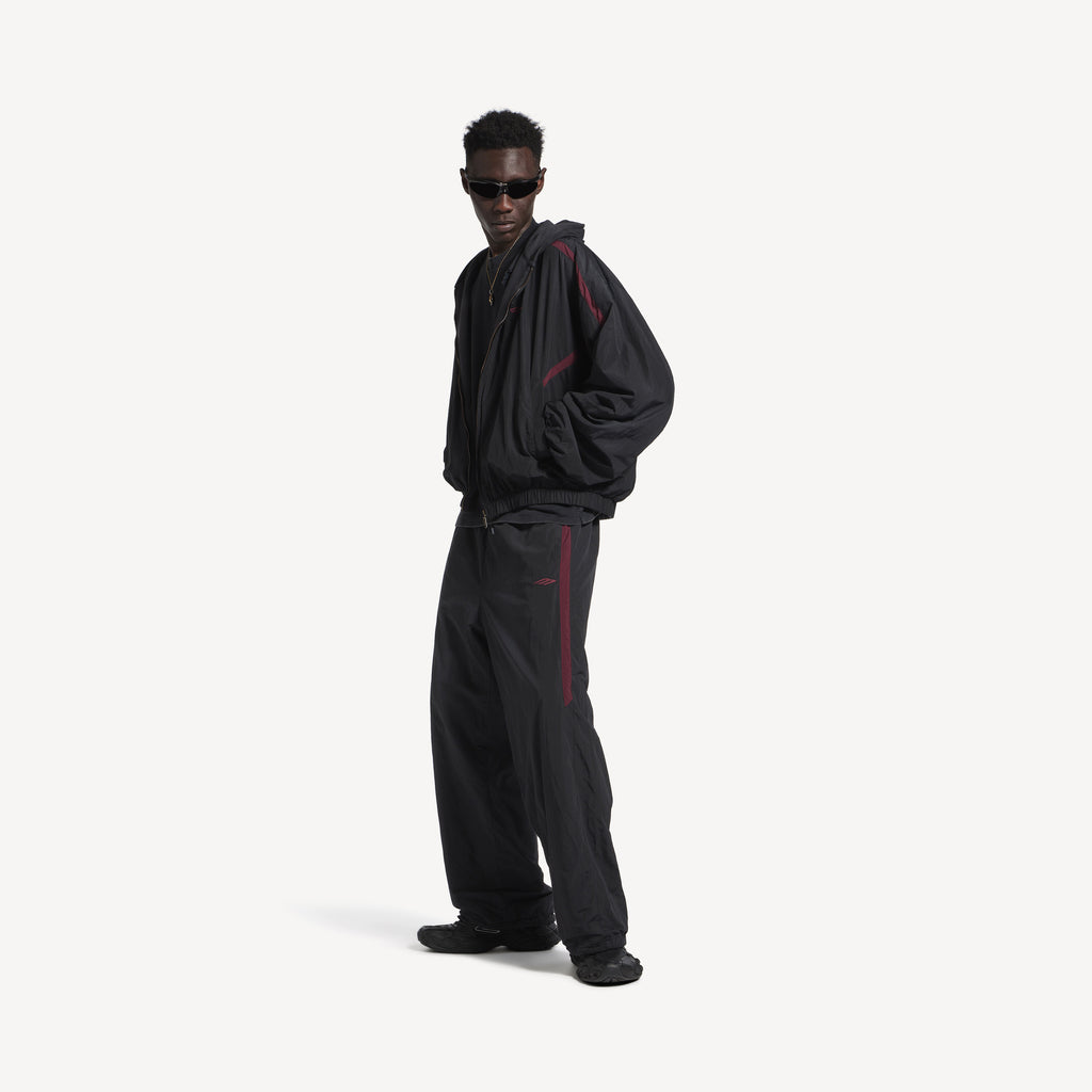 BALENCIAGA REVERSIBLE TRACKSUIT PANTS IN BLACK