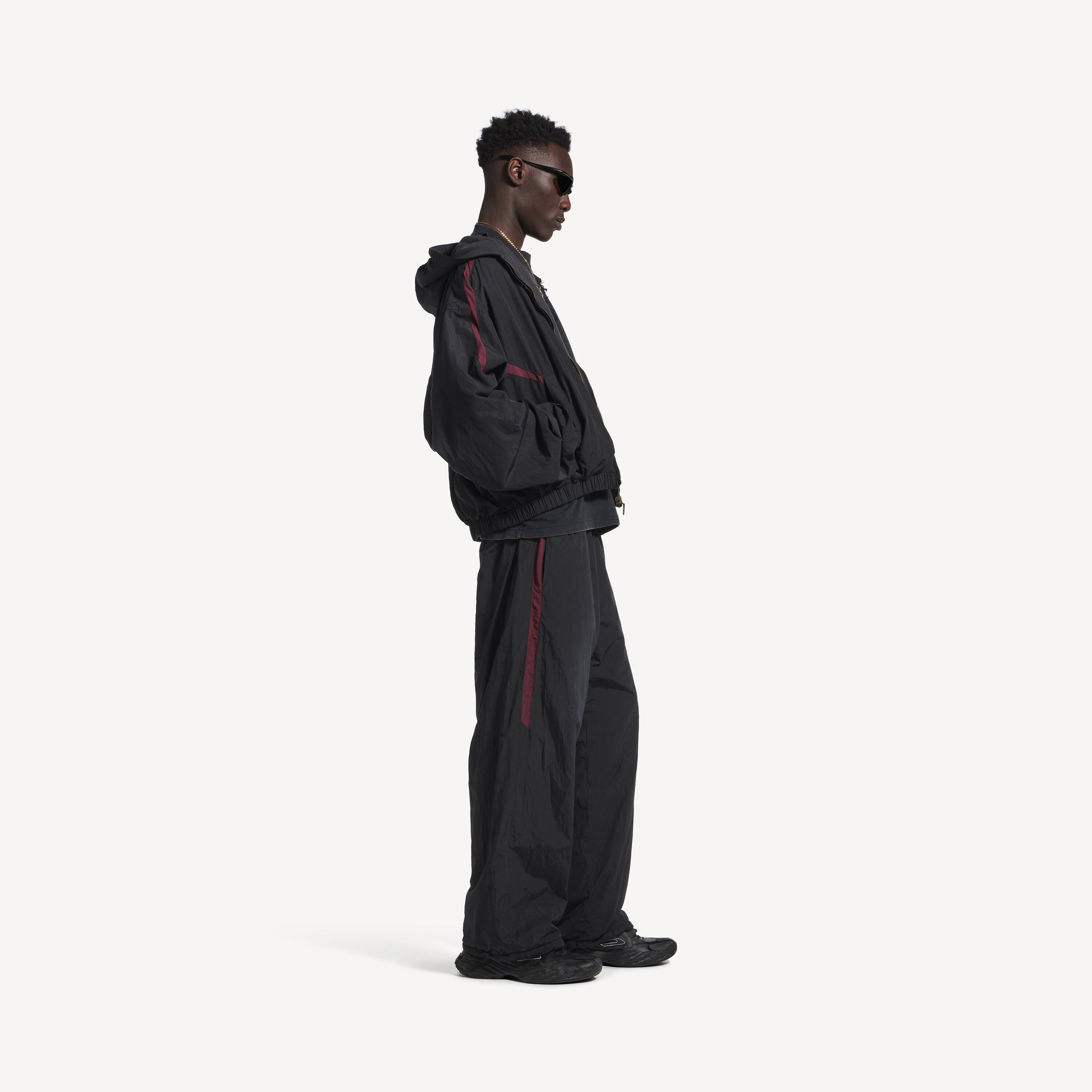 BALENCIAGA REVERSIBLE TRACKSUIT PANTS IN BLACK