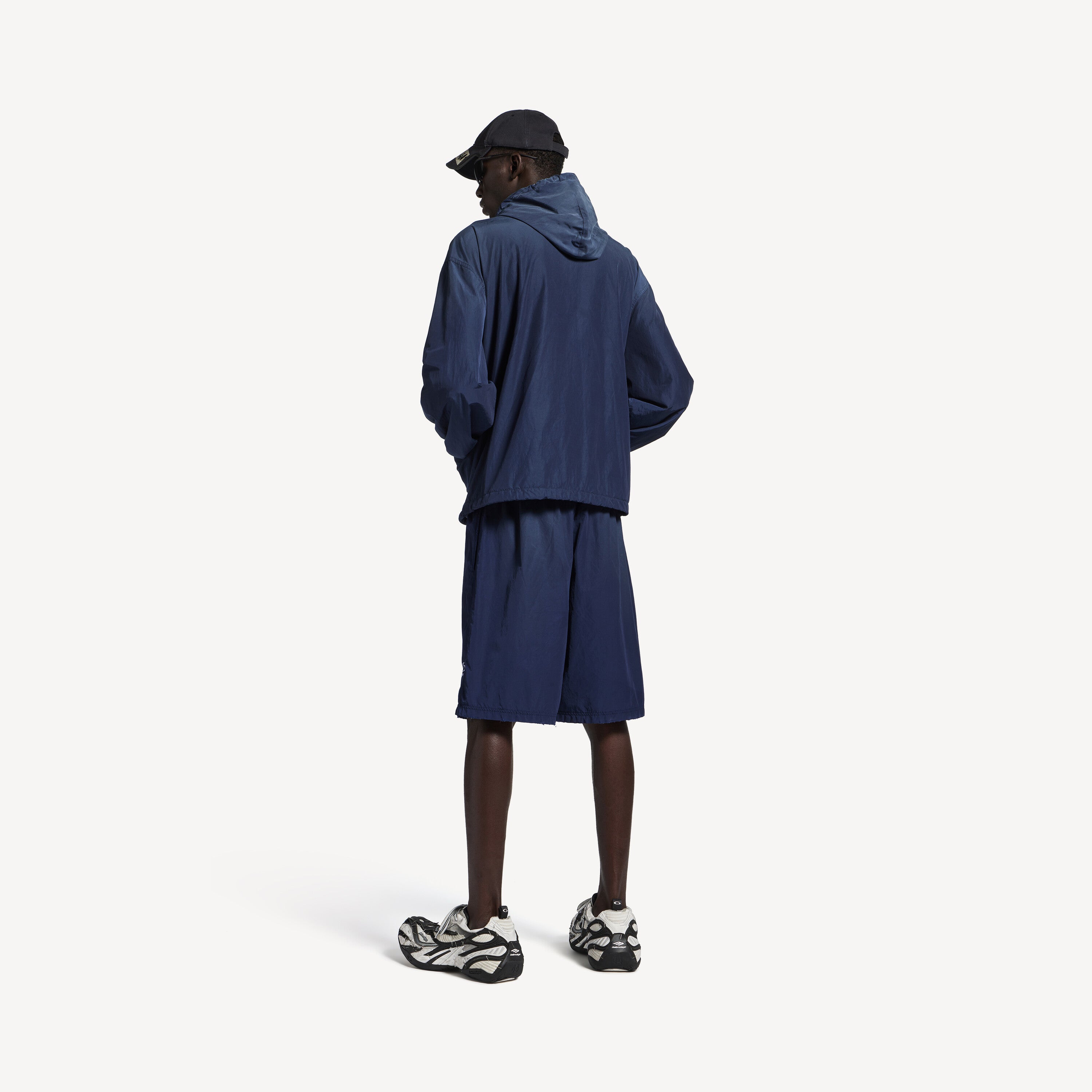 BALENCIAGA HOODED RAIN JACKET IN MARINE BLUE