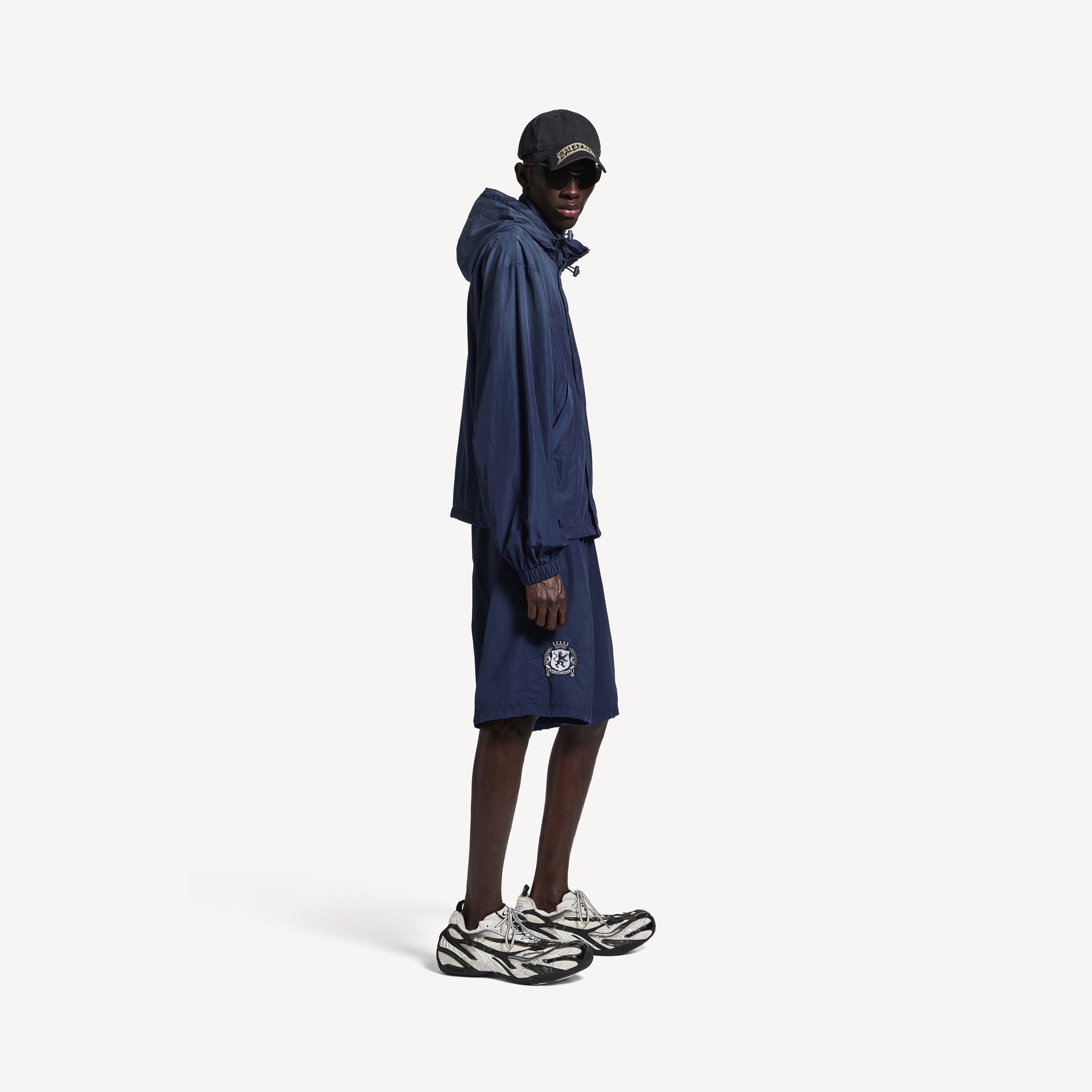 BALENCIAGA HOODED RAIN JACKET IN MARINE BLUE