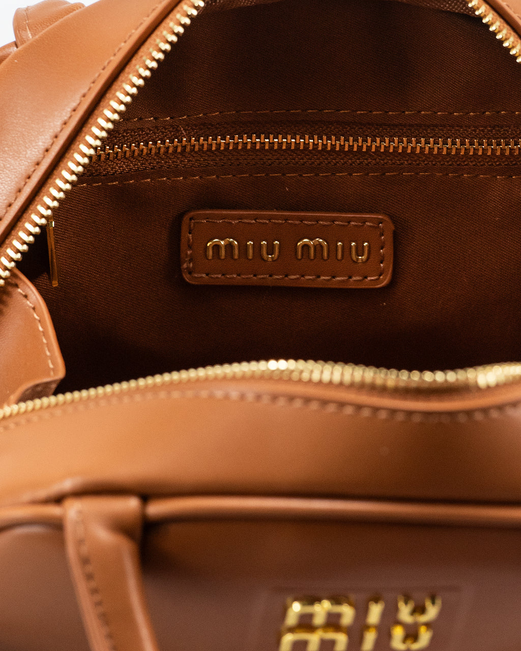 MIU MIU LEATHER TOP-HANDLE BAG