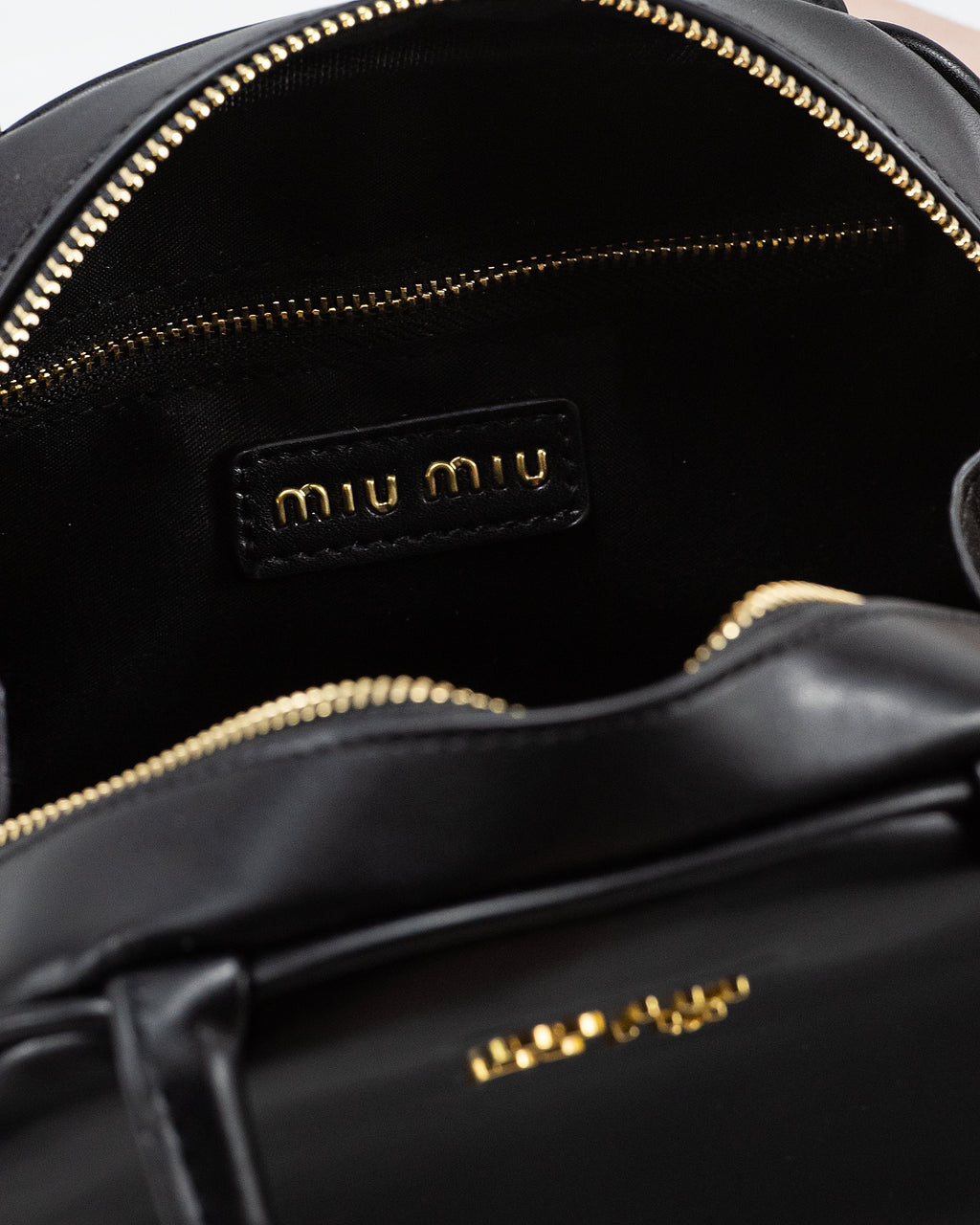 MIU MIU LEATHER TOP-HANDLE BAG
