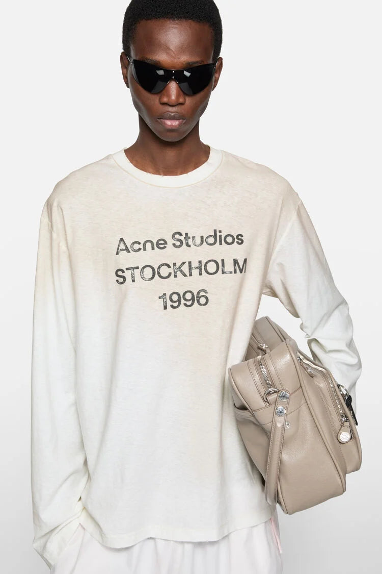 ACNE STUDIOS SPRAYED 1996 LOGO LONGSLEEVE IN DUSTY WHITE