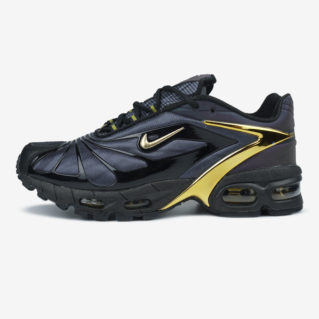 NIKE AIR MAX SKEPTA TAILWIND IN BLACK/GOLD