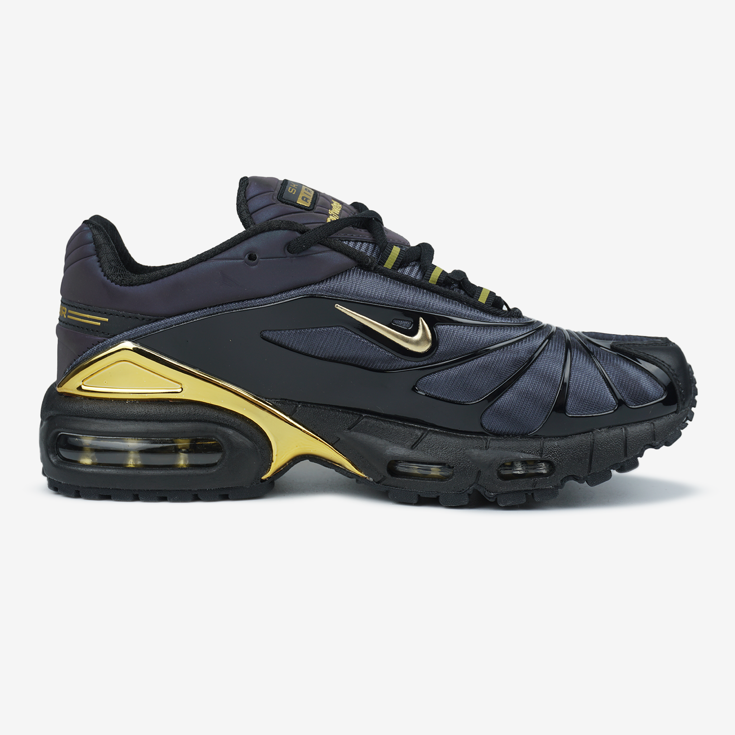 NIKE AIR MAX SKEPTA TAILWIND IN BLACK/GOLD