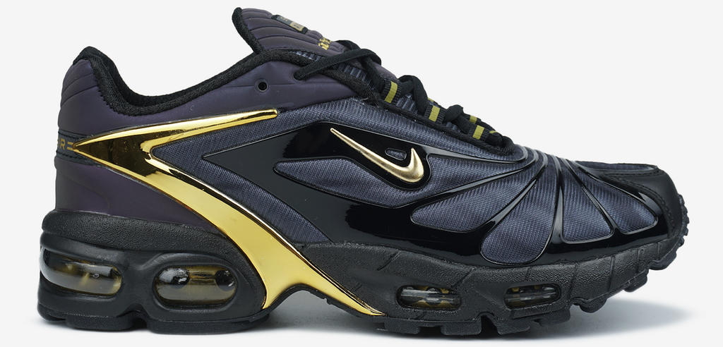 NIKE AIR MAX SKEPTA TAILWIND IN BLACK/GOLD