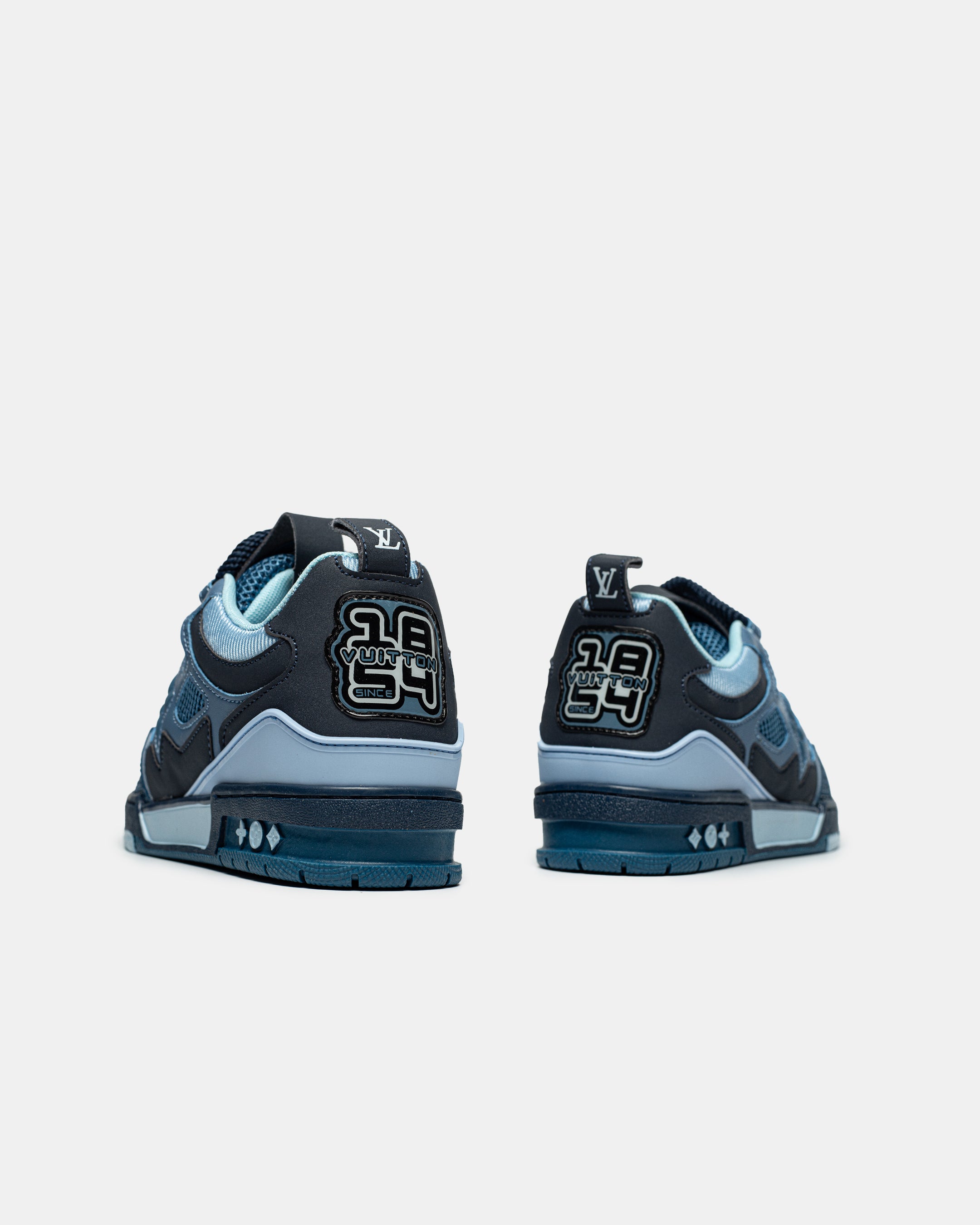 LOUIS VUITTON TRAINER SNEAKER LOW IN “MONOGRAM BLUE”