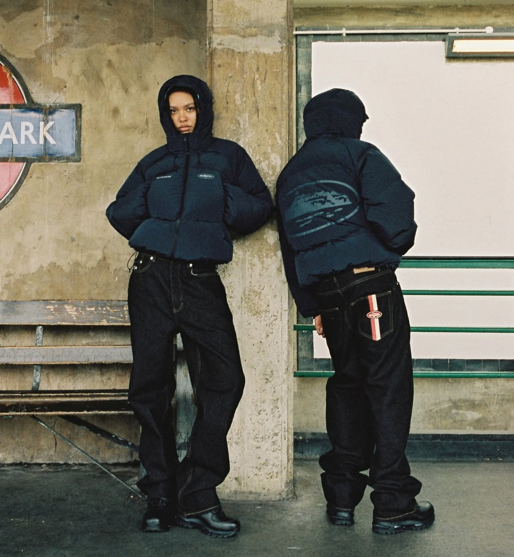 CORTEIZ DUAL STRIPE BAGGY JEANS “BLACK WASH”