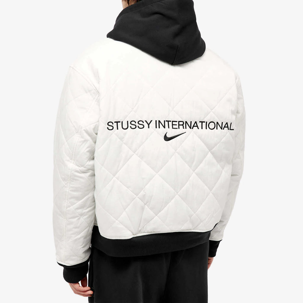 STUSSY X NIKE REVERSIBLE VARSITY JACKET MEDIUM BLACK/SAIL