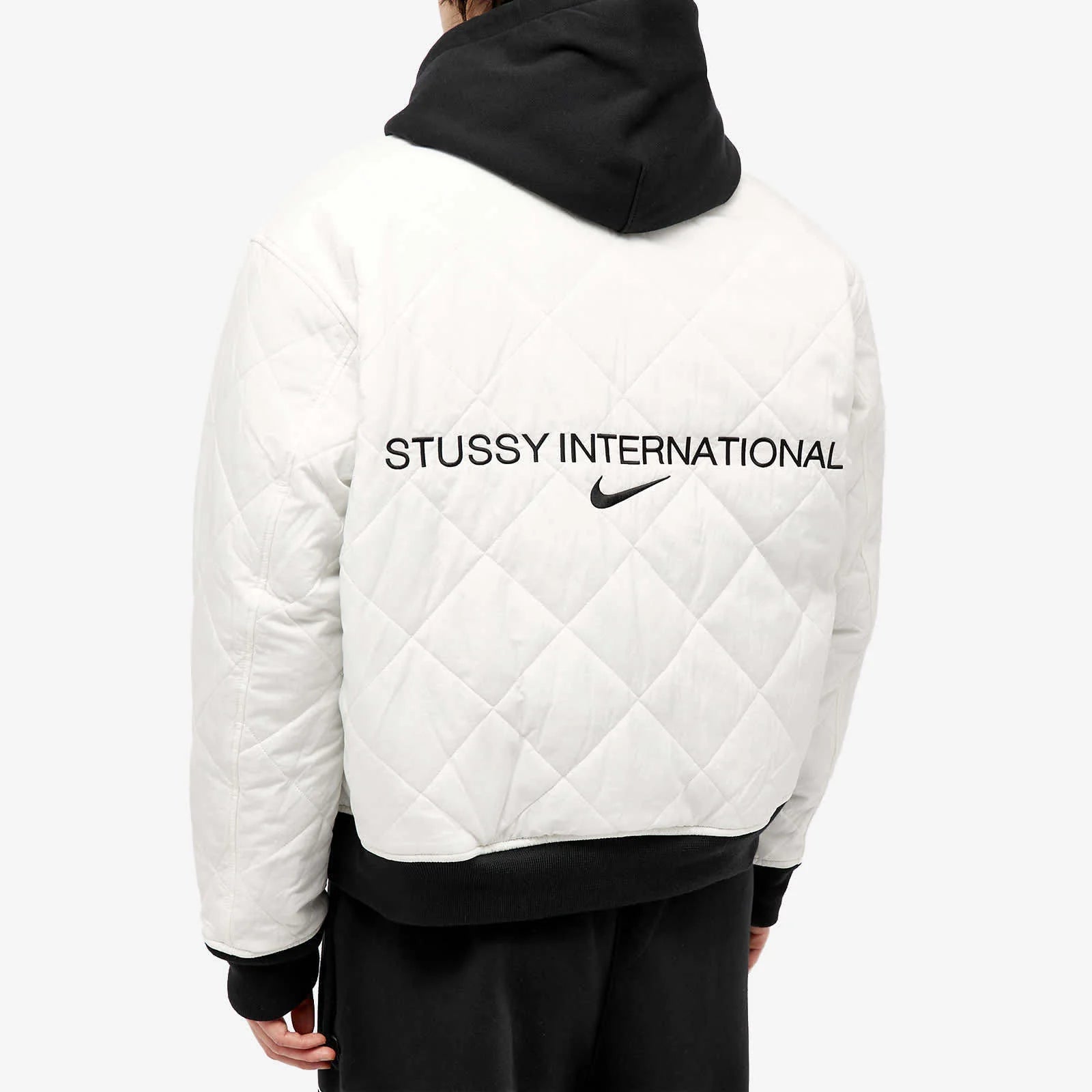 STUSSY X NIKE REVERSIBLE VARSITY JACKET MEDIUM BLACK/SAIL