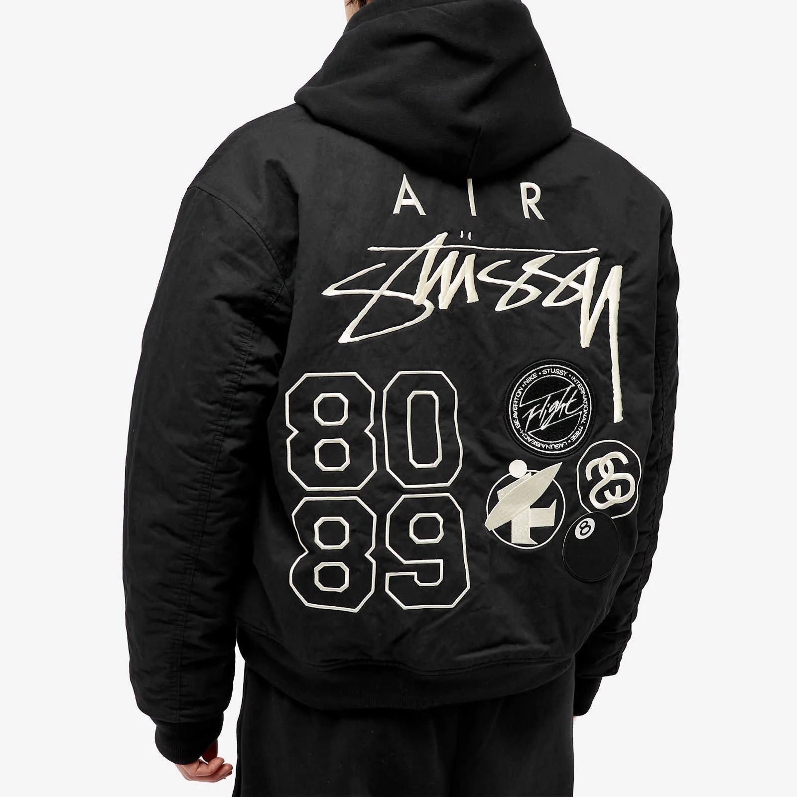 STUSSY X NIKE REVERSIBLE VARSITY JACKET MEDIUM BLACK/SAIL