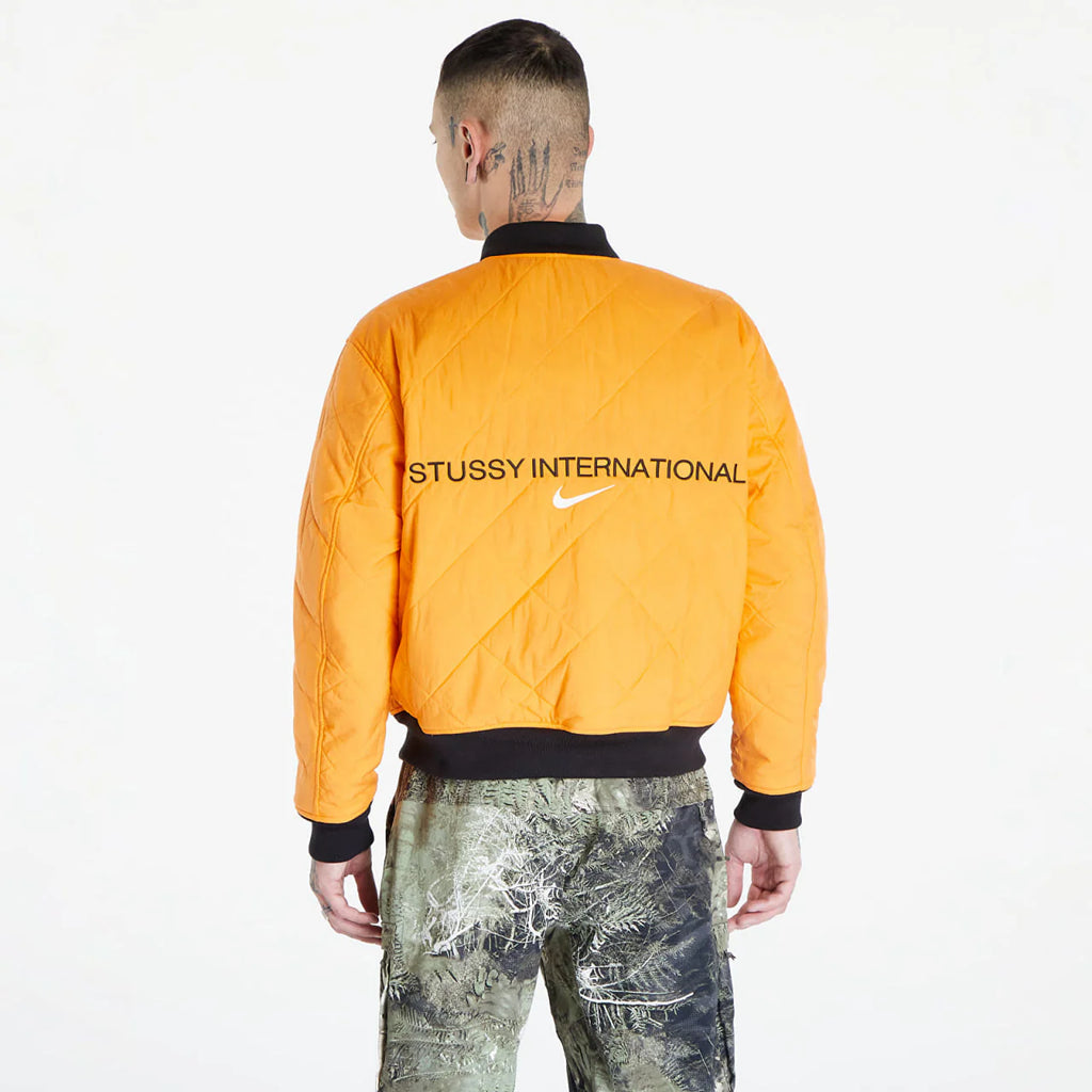 STUSSY X NIKE REVERSIBLE VARSITY JACKET MEDIUM OLIVE/BRIGHT MANDARIN